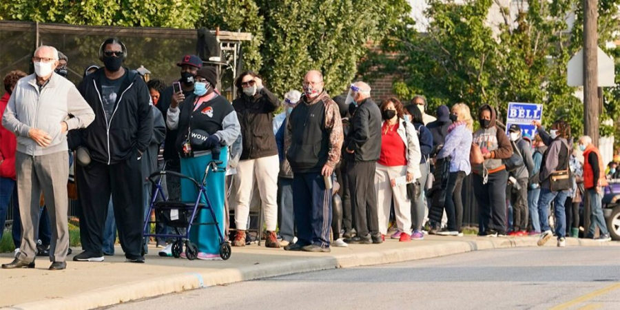 In Cleveland, Ohio, quarter-mile long lines form for early voting.