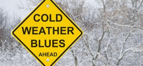 Street sign warning for cold weather blues ahead